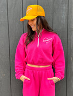 "HARD TO BREAK" QUARTER ZIP CROP in FUSCHIA