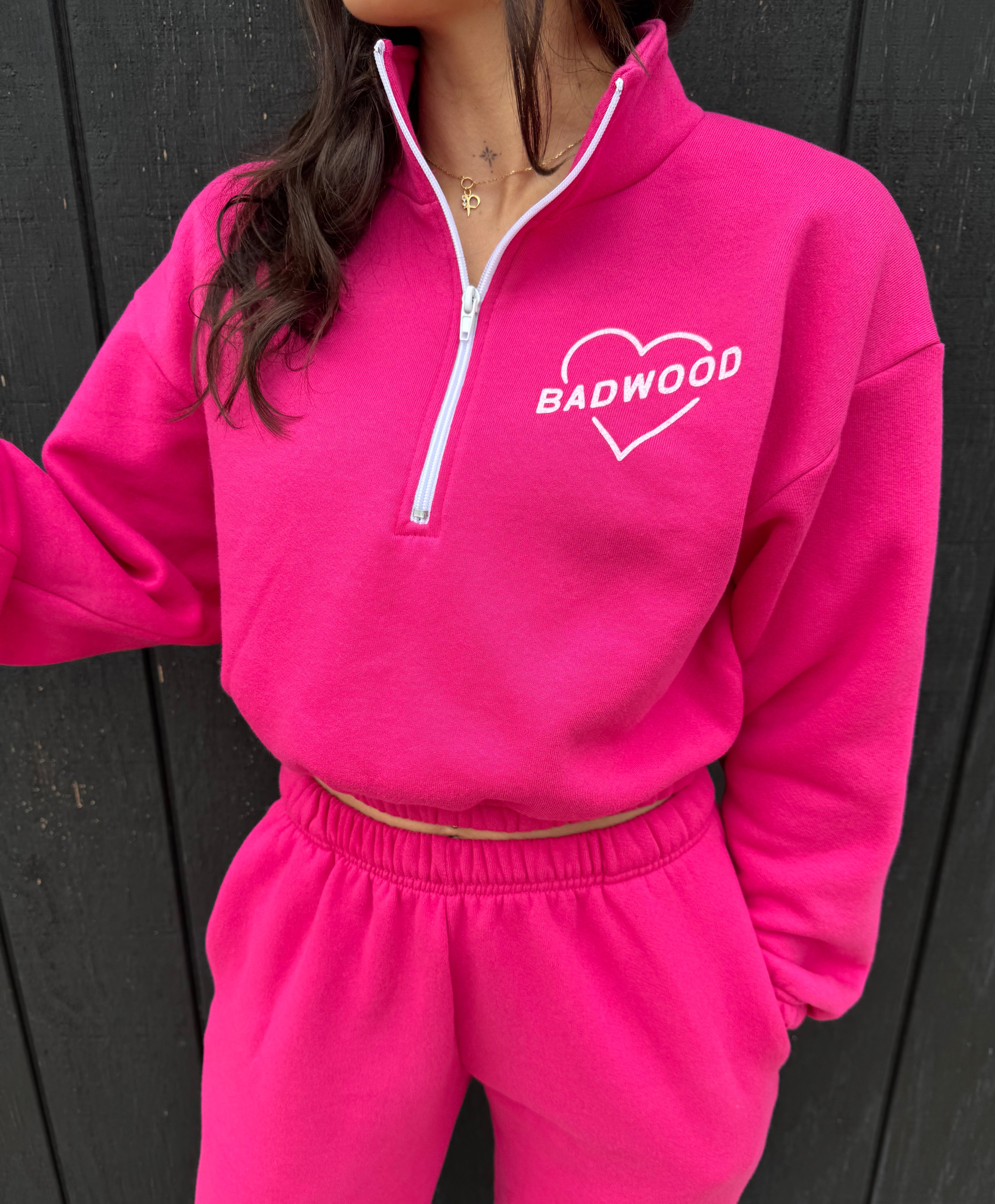"HARD TO BREAK" QUARTER ZIP CROP in FUSCHIA